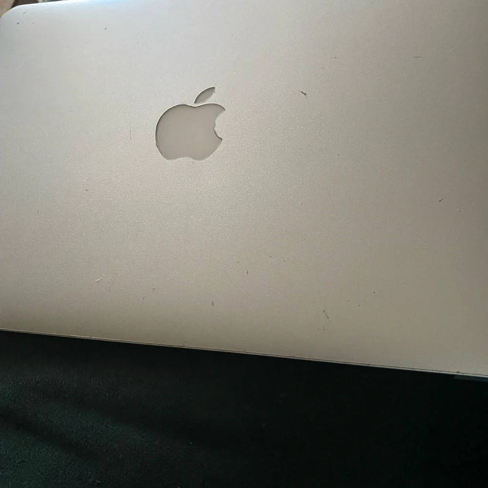 Apple Silver MacBook with Sleek Design and Iconic Logo